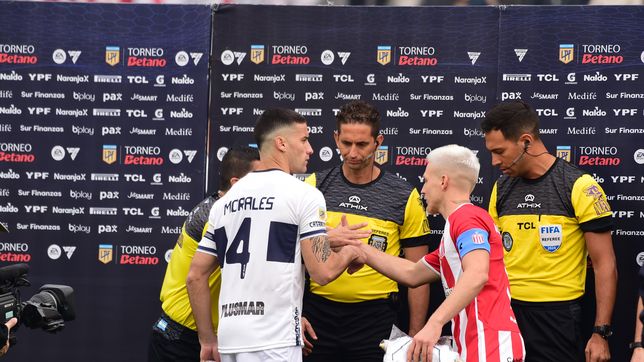 el tenso cara a cara de los capitanes de estudiantes y gimnasia en el sorteo del clasico