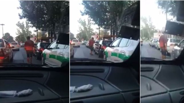 video: violenta discusion entre un taxista y un comerciante armado con un fierro
