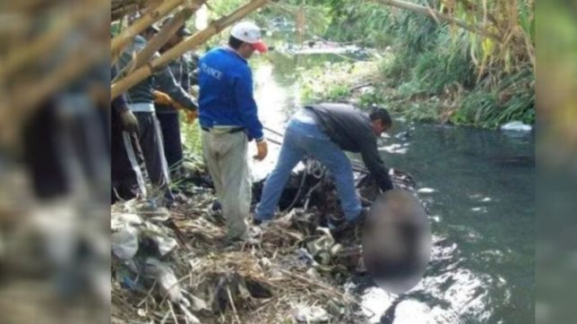 conmocion por el hallazgo de un cuerpo flotando en un arroyo