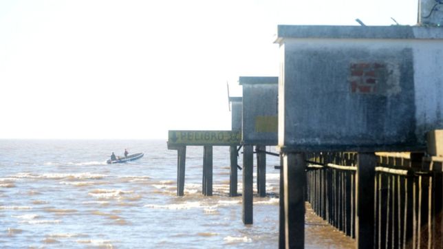 fui al rio a buscarlo: la desesperacion de la pareja de uno de los pescadores desaparecidos