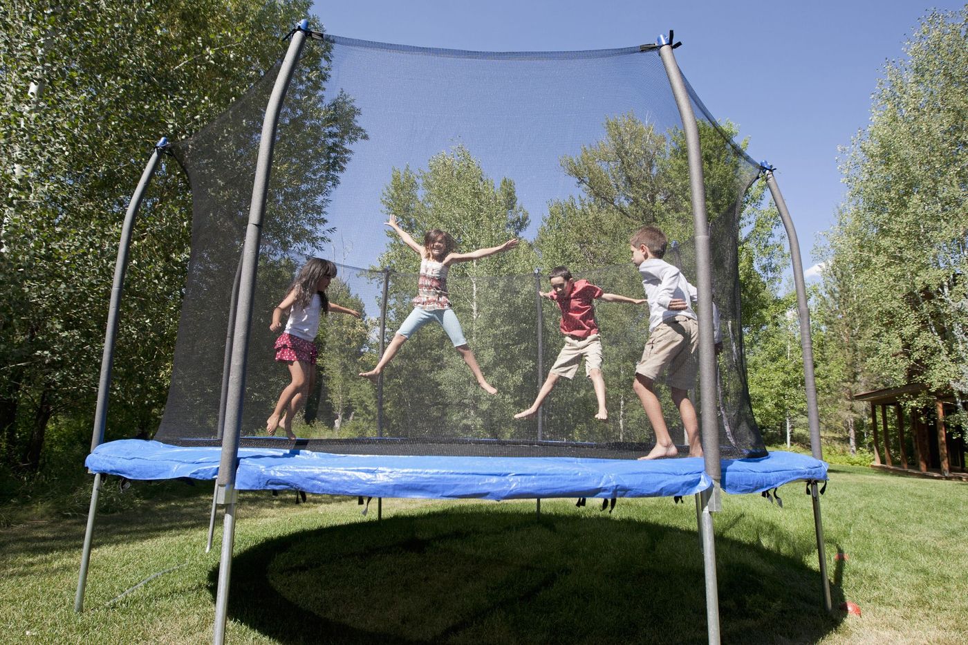 kids-on-trampoline-royalty-free-image-1679937467.jpg