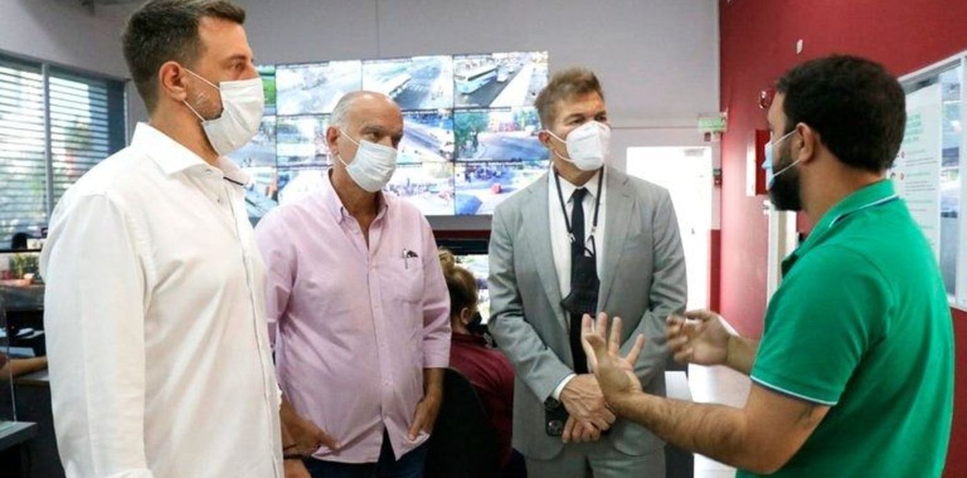 Burlando con Grindetti y Kravetz