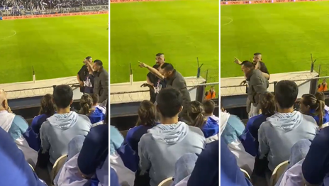 Escoltado y entre dos, así retirraban al hincha de Gimnasia que agarró la camara de la TV en pleno partido