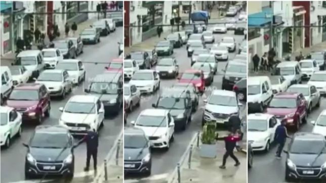 video: un limpiavidrios ataco un auto a patadas en pleno centro y termino detenido