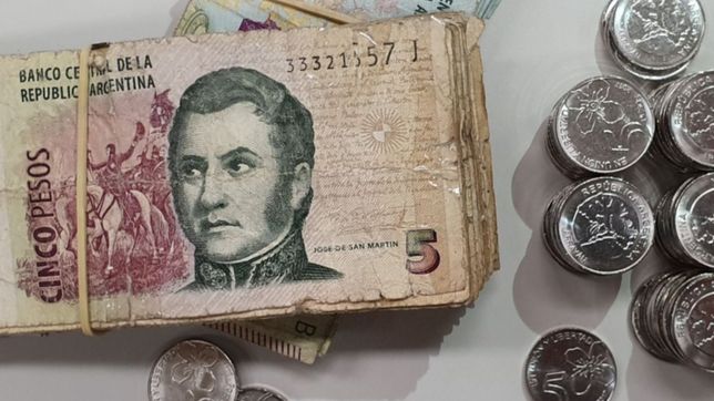 los comerciantes piden seis meses mas de vida para el billete de $5