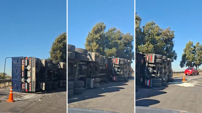 el impresionante vuelco de un camion en la subida de la autopista genero un caos de transito
