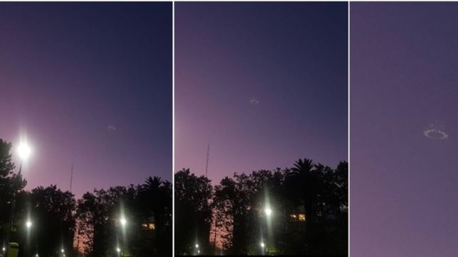 tomaba un helado en plaza malvinas, vio algo en el cielo y le saco fotos a ¿un ovni?